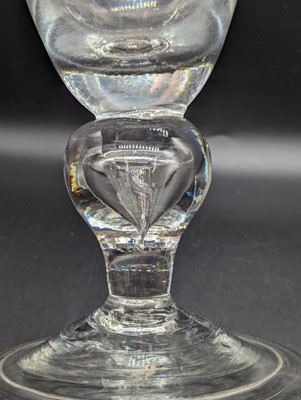 Lot 2133 - An oversized drinking glass, the round funnel...