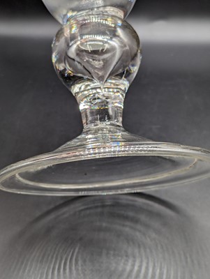 Lot 2133 - An oversized drinking glass, the round funnel...