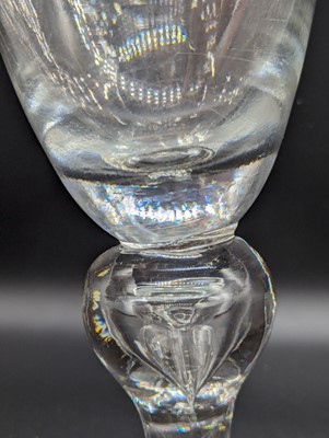 Lot 2133 - An oversized drinking glass, the round funnel...