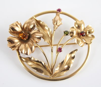 Lot 2662 - A yellow metal multi-stone openwork floral...