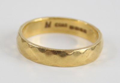 Lot 2537 - An 18ct gold and faceted quartz shaped wedding...