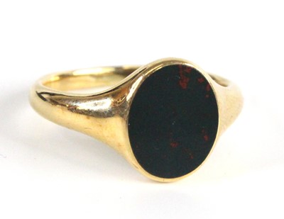 Lot 2546 - An 18ct gold bloodstone set signet ring, the...