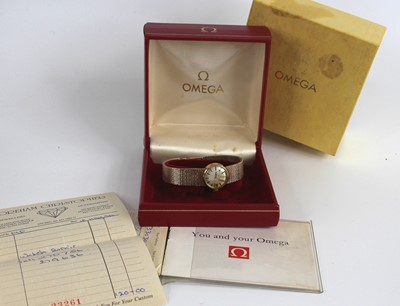 Lot 2556 - An Omega lady's 9ct gold automatic bracelet...