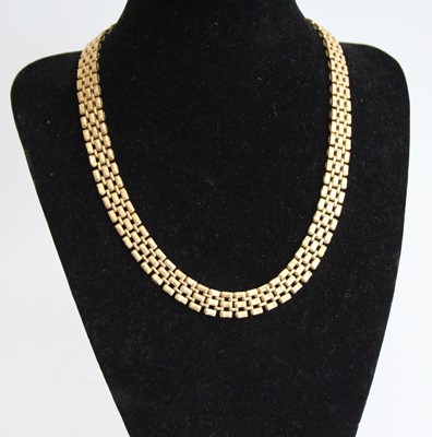 Lot 2750 - A 9ct heavy gold triple row choker, each link...