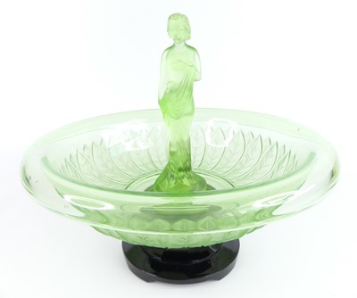 Lot 47 - A French Art Deco moulded green glass pedestal...