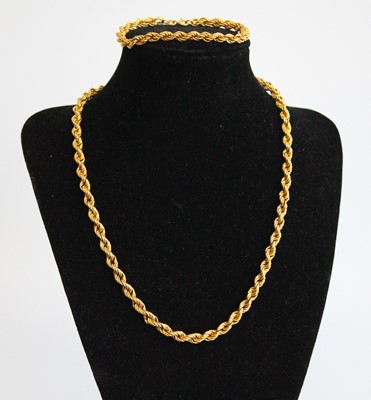 Lot 2860 - A modern 9ct gold ropetwist necklace, 44cm;...