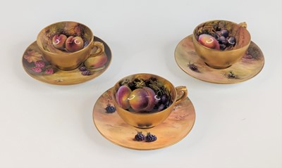 Lot 2108 - A set of three Royal Worcester miniature tea...