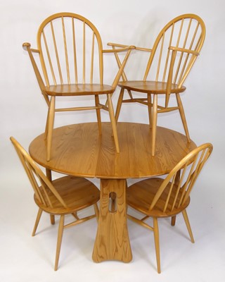 Lot 389 - A contemporary Ercol blond elm breakfast suite,...