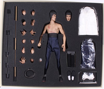Lot 1746 - A Hot Toys Ltd 1/6 scale figure of Bruce Lee...