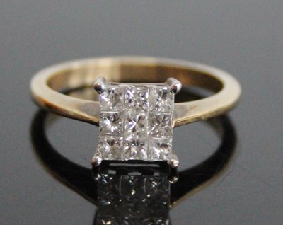 Lot 2839 - A 9ct yellow and white gold diamond square...