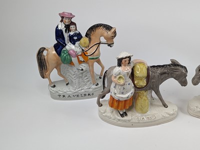 Lot 12 - A pair of Victorian Staffordshire flat back...