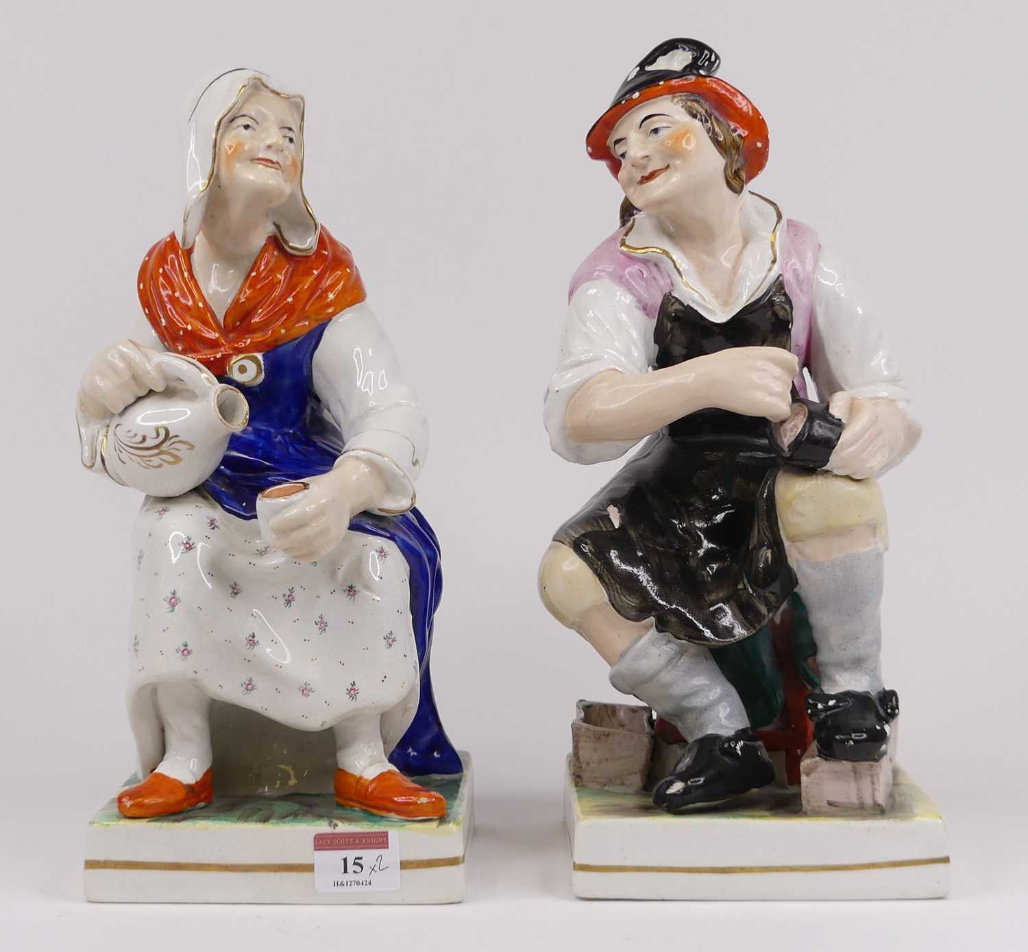 Lot 15 - A pair of Victorian Staffordshire pottery...