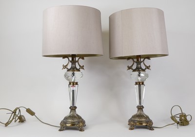 Lot 10 - A pair of modern brass and cut glass table...