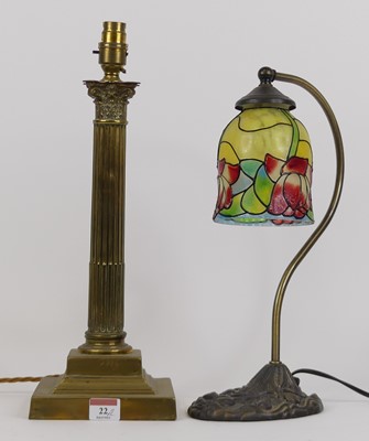 Lot 22 - A brass table lamp, in the form of a...