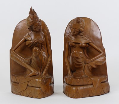 Lot 28 - A pair of Asian carved hardwood figural...