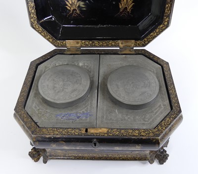 Lot 29 - A 19th century Chinese gilt and black lacquer...