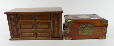 Lot 51 - An oak table top jewellery box in the form of...
