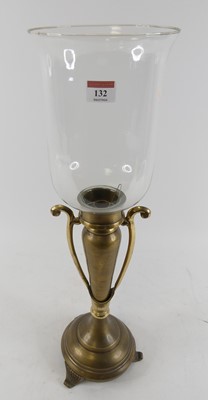 Lot 132 - A brass table candlestick, having a clear...