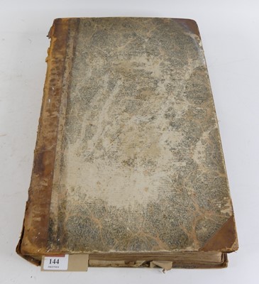 Lot 144 - A large leather bound album of pressed British...