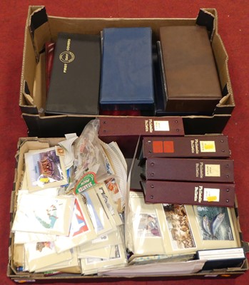 Lot 163 - Two boxes containing albums of stamps, PHQ...