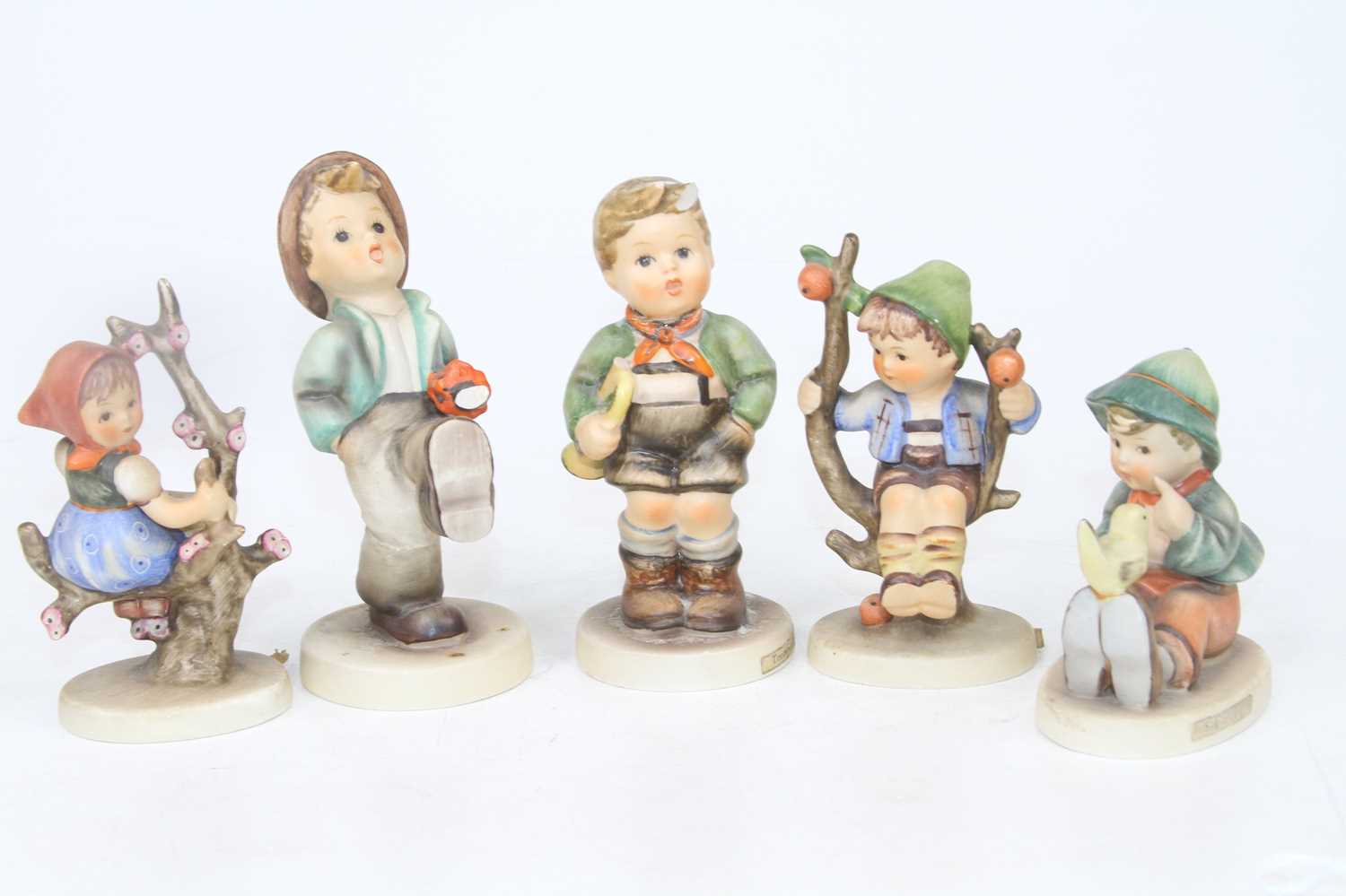 Lot 176 - A collection of five Goebel's pottery figures...