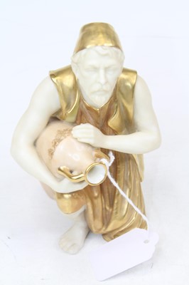 Lot 179 - A Royal Worcester figure of a water-carrier,...