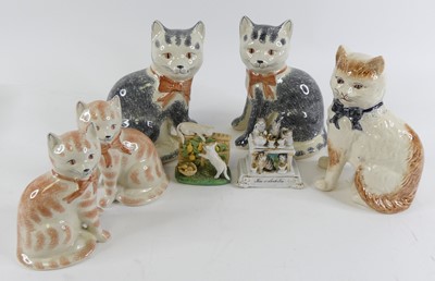 Lot 90 - A pair of Rye pottery models of seated cats,...