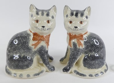 Lot 90 - A pair of Rye pottery models of seated cats,...