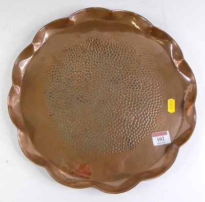 Lot 102 - An early 20th century copper warming plate,...
