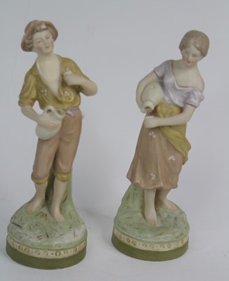 Lot 207 - A pair of Royal Dux figures, each h.21.5cm