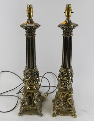 Lot 109 - A pair of large modern gilt metal table lamps...