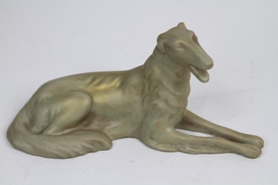 Lot 215 - A Royal Dux gilt decorated model of a dog,...