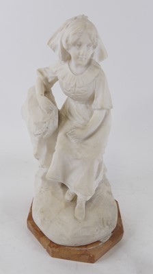 Lot 118 - A carved white marble figure of a young girl...