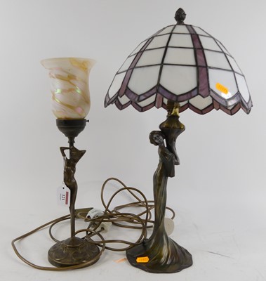 Lot 121 - A bronzed metal figural table lamp, having a...