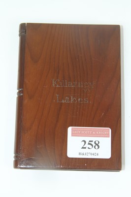Lot 258 - A carved arbutus wood souvenir card case, in...