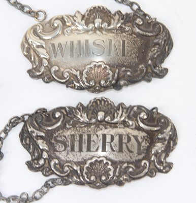 Lot 263 - A pair of Elizabeth II silver decanter labels,...