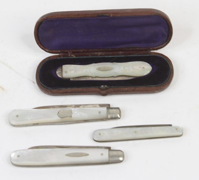 Lot 465 - A collection of four silver bladed and mother...