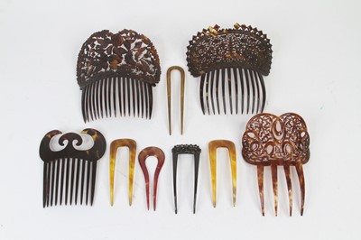 Lot 475 - A collection of carved/faux tortoiseshell hair...