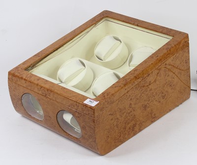 Lot 502 - A birds-eye maple electric wristwatch winder