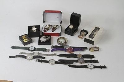 Lot 499 - A collection of mixed fashion wristwatches, to...