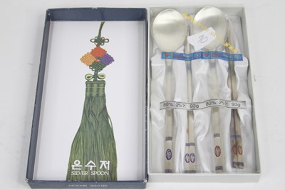 Lot 449 - A Chinese white metal spoon and chopstick set,...