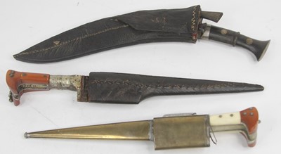 Lot 539 - A vintage kukri with leather sheath, together...