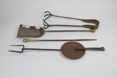 Lot 540 - A collection of antique fire tools