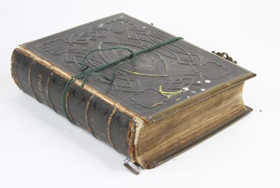 Lot 541 - A Victorian family bible, bound in tooled...