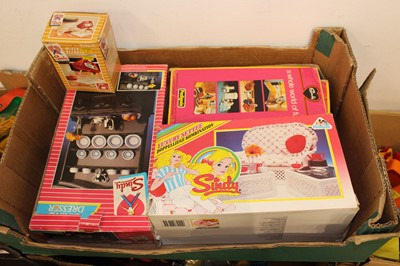 Lot 667 - Three trays containing Sindy dolls related...