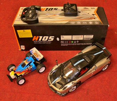 Lot 678 - Three modern issue diecast radio controlled...