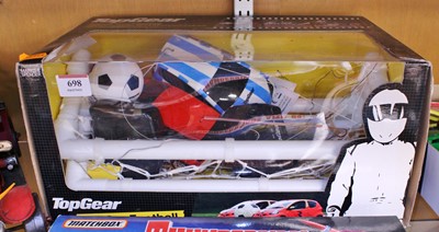 Lot 698 - A Top Gear radio control car football boxed...