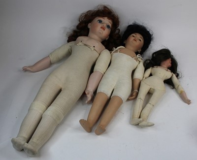 Lot 720 - A Bruj bisque headed doll; together with two...