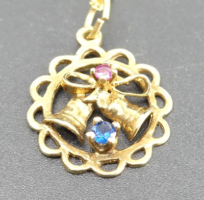 Lot 305 - A modern 9ct rose gold, sapphire and ruby set...