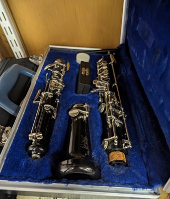 Lot 706 - A B&H Bandhite cased flute, together with one...